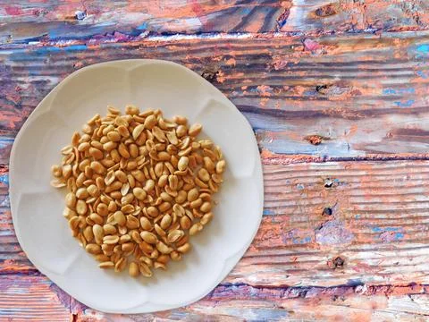 Peanuts On Wooden Background Stock Photos