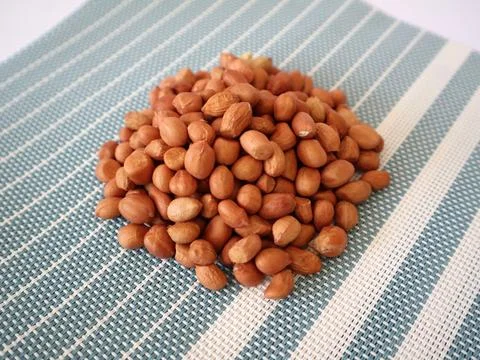 Peanuts on a wrapping cloth Stock Photos