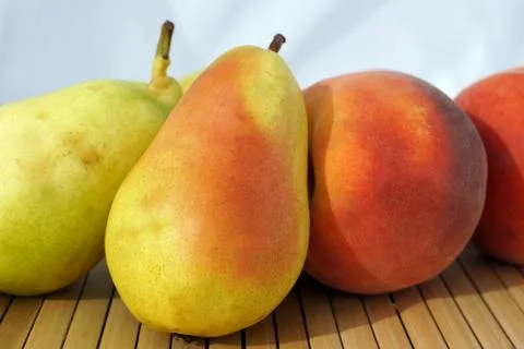 Pear and peach Stock Photos