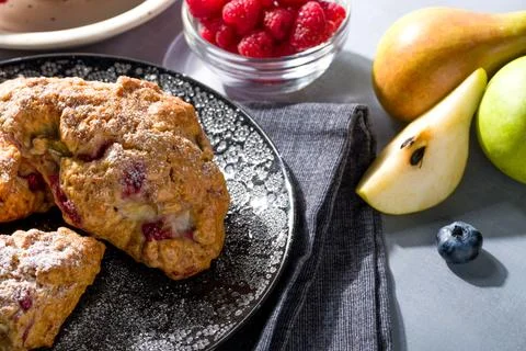 Pear and raspberry scones. Fresh pastries 스톡 사진