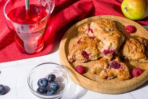 Pear and raspberry scones. Fresh pastries 库存照片