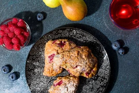 Pear and raspberry scones. Fresh pastries. Flat lay 스톡 사진