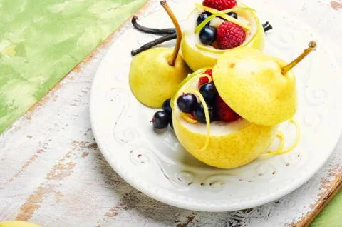 Pear with berry stuffing Stock Photos