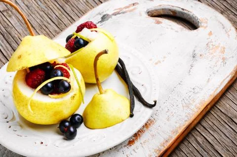 Pear with berry stuffing Stock Photos