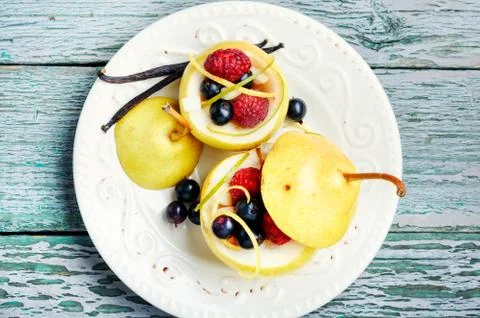 Pear with berry stuffing Stock Photos
