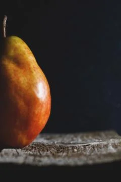 Pear on black background. Copy space. Stock Photos