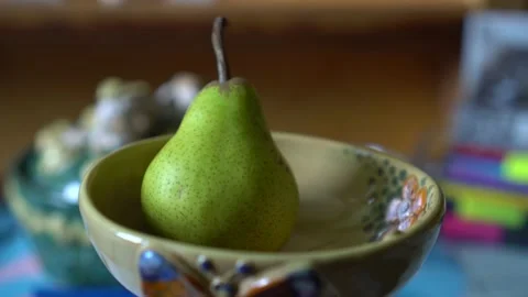 Pear in the bowl Stock Footage 131430353