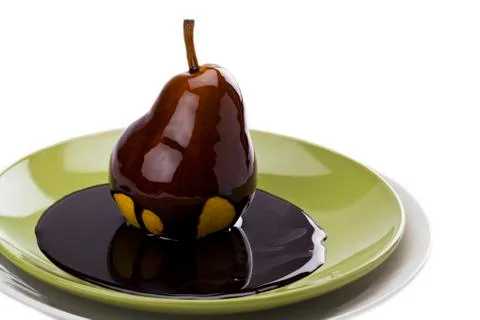Pear with chocolate Stock Photos
