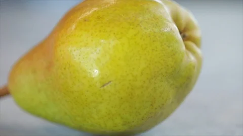 Pear Circling Spinning Around Itself Closeup Stock Footage 99137932