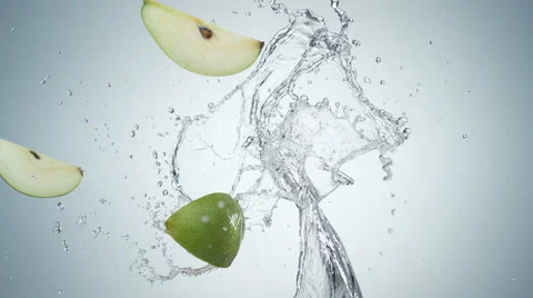 Pear colliding against water splash. Slow Motion. Stock Footage 56697142