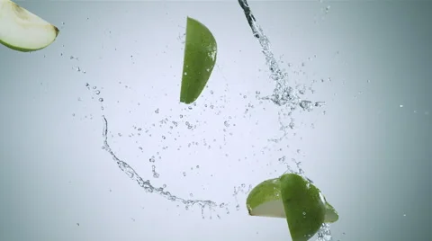 Pear colliding against water stream. Slow Motion. Stock Footage 55881513