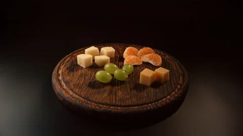 Pear cubes, cheese cubes, grapes, tangerine for making canapes Stock Footage 148633281
