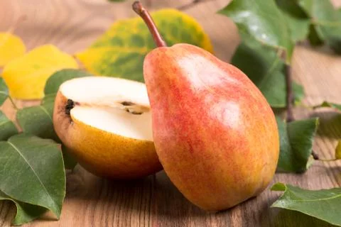 Pear cut into two halves Stock Photos
