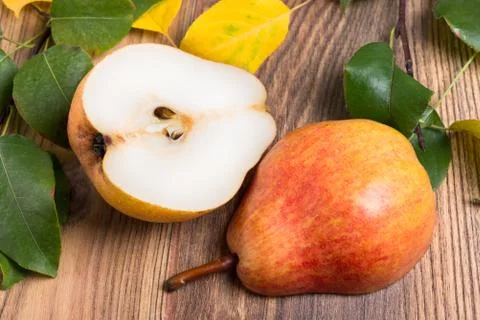 Pear cut into two halves Stock Photos