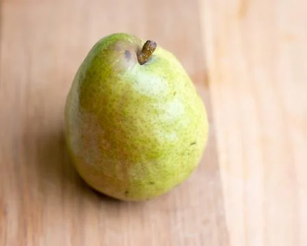 Pear on cutting board Stock Photos
