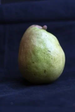 Pear on cutting board Stock Photos