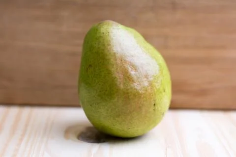 Pear on cutting board Stock Photos