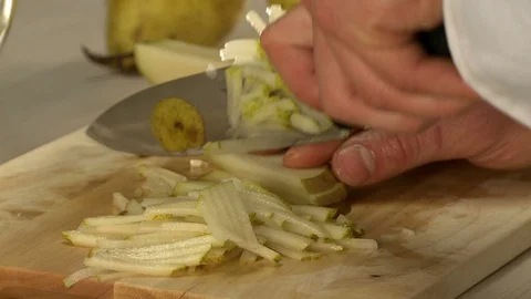 Pear cutting on a board view Stock Footage 122695197