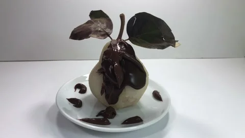 Pear dessert with chocolatte. Stock Footage 97391330