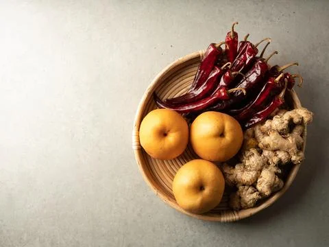 Pear, dried chilli and ginger Stock Photos