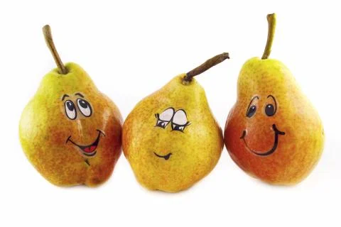 Pear with a face isolated on white Stock Photos