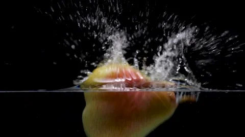 Pear Falling Into Water Splash Slow Motion Video stock 135493018