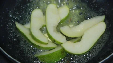 Pear on frying pan 스톡 동영상 48397474