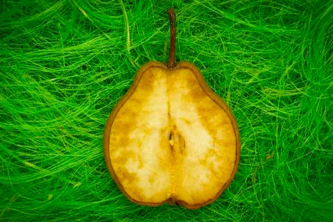 Pear on grass Stock Photos