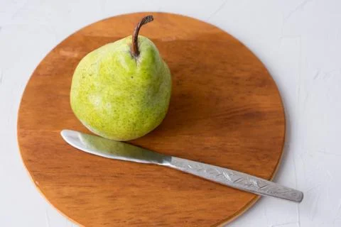 Pear on the green background Stock Photos