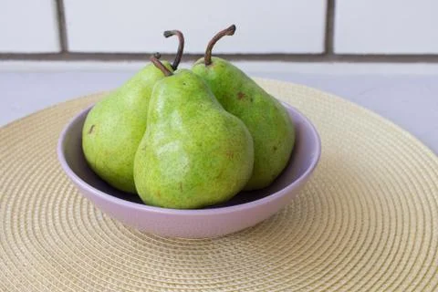 Pear on the green background Stock Photos