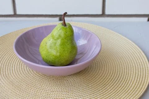 Pear on the green background Stock Photos