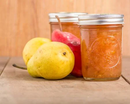 Pear jam in mason jars 스톡 사진