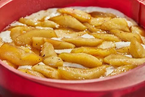 Pear pie in silicone mold before baking in the oven Stock Photos