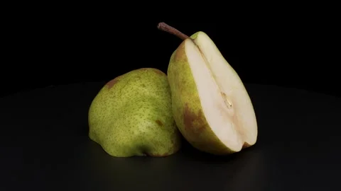 A pear slowly rotating. Stock Footage 318049897