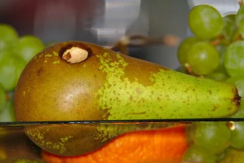 A pear on the table Stock Photos