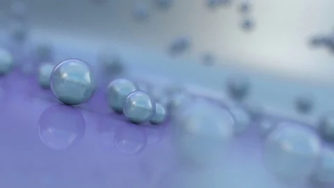 Pearl balls moving along the surface Stockbeeldmateriaal 71794307