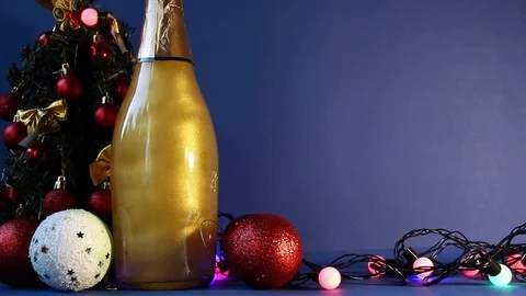 Pearl Champagne and Christmas tree. New Year celebration Stock Footage 113689903