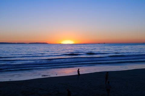 Pearl Colored Waves &amp; Sunset Stock Photos