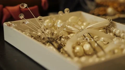 Pearl earrings are on the table Stock-Footage 140908624
