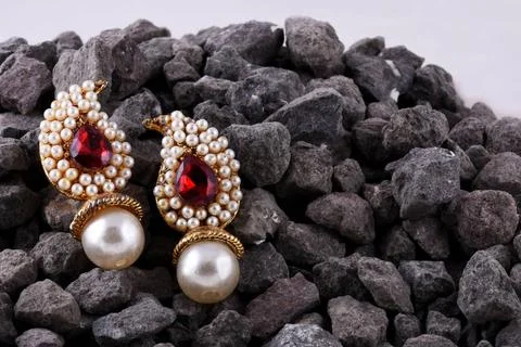 Pearl earrings with ruby gem, Luxury female jewelry, Indian traditional je... 스톡 사진