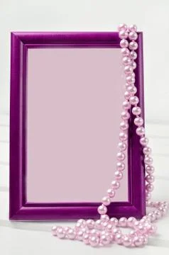 Pearl with empty frame picture Stock Photos