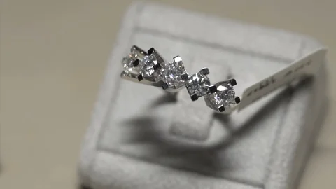Pearl ring shine diamonds. D color pearl ring in jeweler shop Stock Footage 118687361