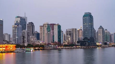 Pearl River waterfront lights emerging at dusk in timelapse in Guangzhou China Stockbeeldmateriaal 346030757