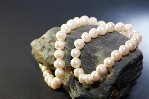 Pearl On Stone Stock Photos