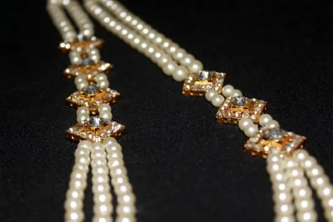 Pearl strings abstract necklace background Stock Photos