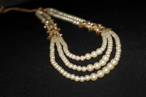 Pearl strings abstract necklace background Stock Photos