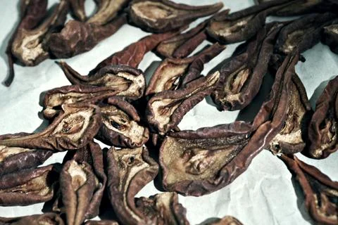 Pears also drying. Selective focus on pears on plane paper. Close up Stock Photos