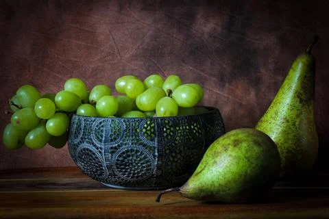 Pears and grapes Stock Photos