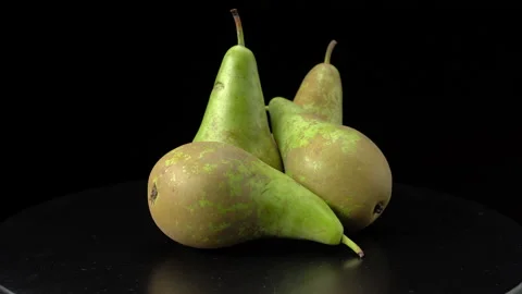 Pears on a black background close-up. Video stock 147723277