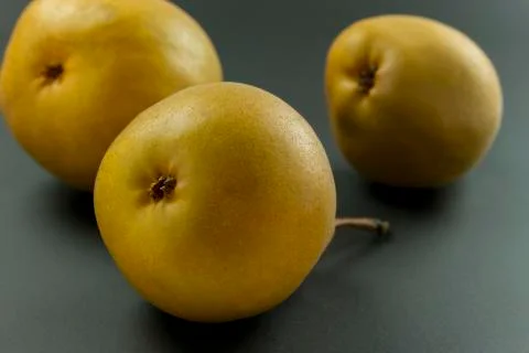 Pears on black Stock Photos